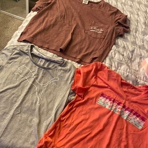 bundle of three shirts